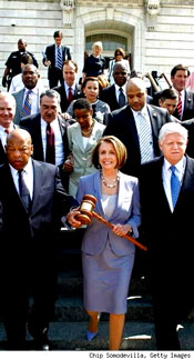 The president thanked Pelosi for passing the bill through the House, and spoke directly to the members of Congress who voted for it. "I know this wasn't an easy vote for people, but it was the right vote," he said. "This is what change looks like."  (Photo source: Chip Somodevilla, Getty Images.)  