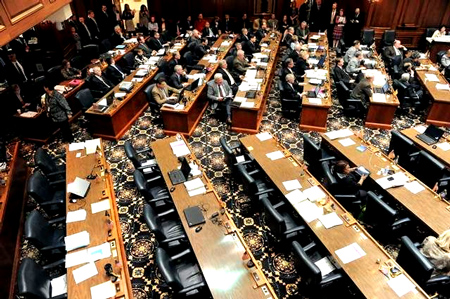 Seats on one side of the Indiana House were nearly empty today as House Democrats departed the the state rather than vote on anti-union legislation.  