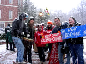 It snowed, but they still came.  A heavy snowfall blanketed a global warming protest outside the State House in Annapolis this morning, but it did not dampen the shouts of about 400 activists who urged lawmakers to pass the nation's toughest greenhouse gas control law.  (Ah, shades of living in Asheville, NC - Webmaster.) 