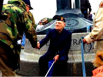 "Later in the morning, veteran Mike Lauriente was accepting handshakes from demonstrators. He served in Sicily and French Morocco, and declared the memorial, which he was seeing for the first time, beautiful. "The spirit that I see here is overwhelming." - WTOP