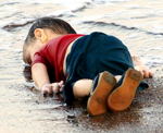 "The child pictured facedown in red T-shirt and shorts was identified as Aylan Kurdi, a Syrian Kurd from Kobani, a town near the Turkish border that has witnessed months of heavy fighting between Islamic State and Syrian Kurdish forces." -  Wall Street Journal, September 3, 2015  