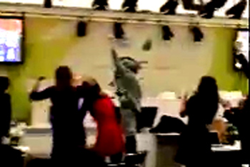 Click on photo to watch progressives journalists jump for absolute job over passage of world climate bill in Paris in December 2015. - Source: Ms. Miranda Johnson, Enviromental Correspondent, London