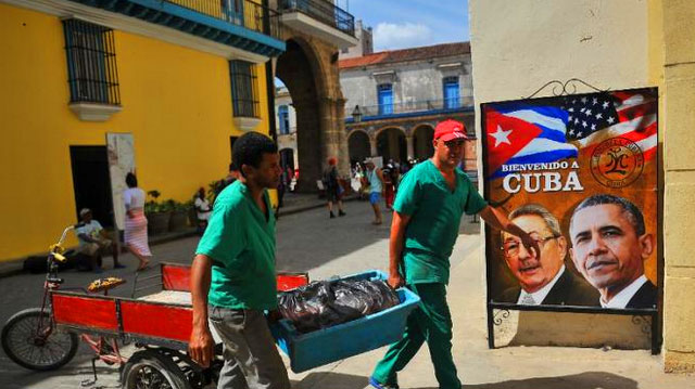 "The poster, put up in the street near a cathedral that Obama is expected to visit after his arrival Sunday, is a montage showing Obama alongside Raul Castro, the Cuban president and brother of Fidel. 'Welcome to Cuba,' the poster says under the Stars and Stripes and the Cuban flag." - Yahoo News 