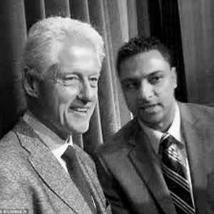Arrested IT specialist, Imran Awan, pictured with former President, Bill Clinton. - See Google Images  