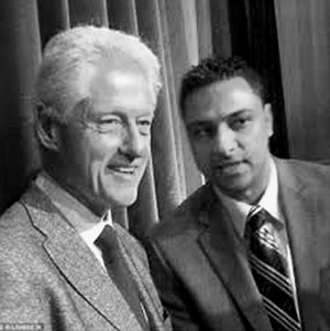 Arrested IT specialist, Imran Awan, pictured with former President, Bill Clinton. - See Google Images  