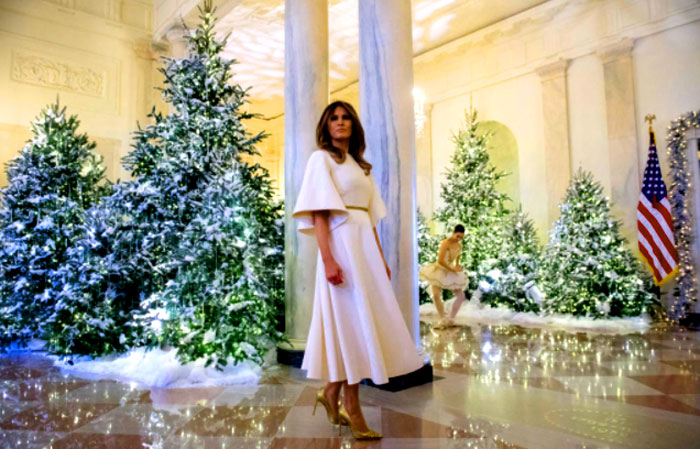 "Schoolchildren at the White House were reportedly in awe of First Lady Melania Trump as she greeted them during a ceremony for the unveiling of Christmas decorations that she helped design. 'She looks like an angel,' one child reportedly said as Melania was embraced by a handful of schoolchildren when she emerged in the White House wearing a caped Christian Dior dress and a thin, gold belt to accent her small waist.  'She seriously looks like an angel,' one of the children said as they greeted Melania." - Breitbart 