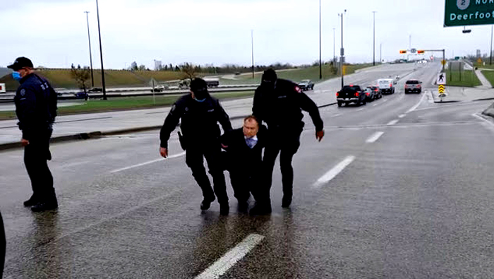 "Canada has become so openly fascist, Pawlowski is the second pastor arrested by the Canadian Gestapo. Back in February, the Canadian Gestapo arrested Rev. James Coates of GraceLife Church of Edmonton after he turned himself in. His crime was the same — holding church services in a fascist country. There are reports the Canadian Broadcasting Corporation (CBC), a far-left fake news outlet, was tipped off to the arrest, which is why CBC photographer Rod Maldaner just happened to be on the scene when the arrest occurred. In a now-deleted tweet the Nazi-With-A-Camera celebrated the arrest and, naturally, passed along fake news." - Breitbart