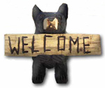 Dan's first chainsaw bear was not too great. His head was TOO SMALL. "We called it the pinhead," said Dan's wife Bette. The second bear was better, but his head was TOO BIG. Then Mountain Dan made his third bear, and it was ... just right! 