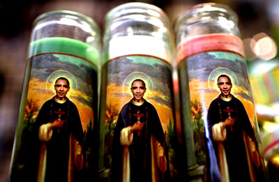 Saint Obama selling in San Francisco at $12.95 a pop, over 1,000 reported to have been moved from inventory.  What can we say?  It's San Francisco, where in the daylight they masterbate in the streets during certain holidays.   Remember comedian Woody Woodbury' of the 1960's, during one of his sets about WWII saying, "Can you imagine me protecting you?"  We thought that appropriate with this candle "stichk."   (Source:  Atlas Shrugs - click on picture for site.)   