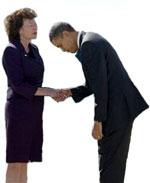 U.S. President Barack Obama bows to Tampa Mayor Pam Iorio at MacDill Air Force Base on January 28, 2010, in Tampa, Florida.   Iorio had honored CAIR annually in Tampa with its own day in November 2008, acknowledging the large amout of Muslims living in the area.  