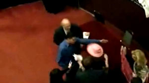 Karl Rove attacked by Code Pink on stage at book event.      