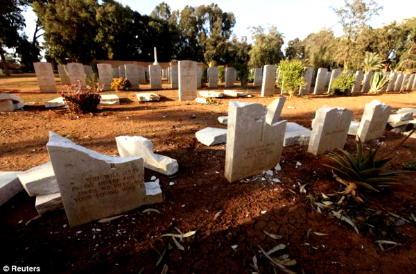 A furious mob has desecrated dozens of Commonwealth War Graves in a Libyan cemetery amid continuing fury in the Middle East over the burning of the Koran by U.S. soldiers.  Headstones commemorating British and Allied servicemen, killed during World War II campaigns in the Western Desert, lay smashed and strewn across Benghazi Military Cemetery.  