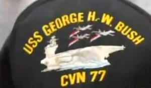 Worker fired for shirt dedicated to his son serving in the Navy.  Now Democrats are offended by an aircraft carrier serving to protect the country.  
